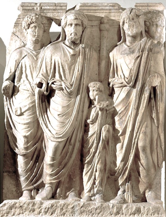 Scene of adoption from Ephesus (Monument of the Parthians, now at the Museum of Ephesus in Vienna): Antoninus Pius (centre) with the seven-year-old Lucius Verus (right) and the seventeen-year-old Marcus Aurelius (left) at the time of their adoption. Next to him could be Publius Elianus Trajan Hadrian (extreme right).