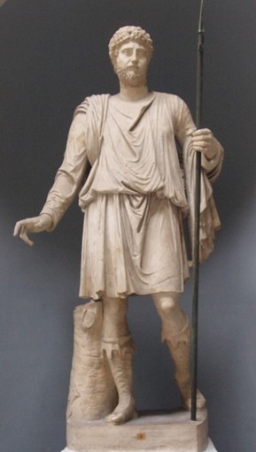 Marble statue depicting Commodus Emperor in his hunter costume (1870-1880). He wears a long-sleeved tunic. Author: Vasari Alessandro (1866/ 1929) - Vatican Museums, Rome