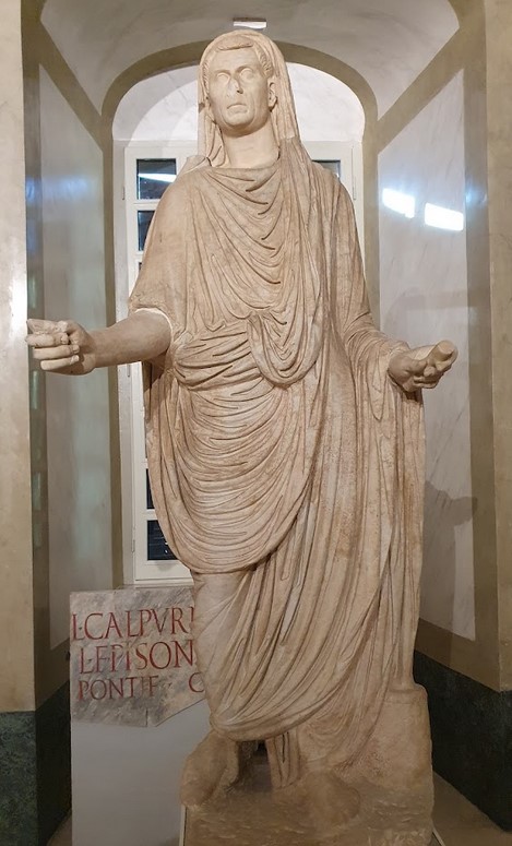 Roman citizen wearing the white toga. Marble statue (2nd century AD), from Veleia. National Museum of Antiquities, Parma