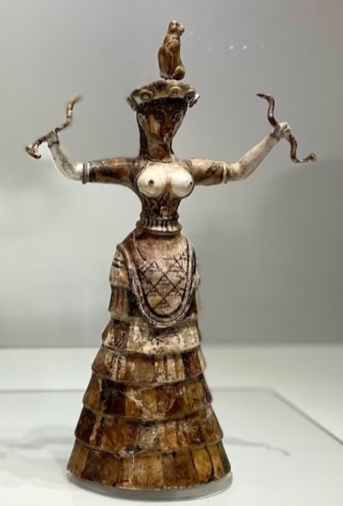 Minoan 'Goddess of the snakes' with tight corset and falbalas skirt. Polychrome terracotta from Knossos (16th century BC) - Iraklion, Museum Archaeological.