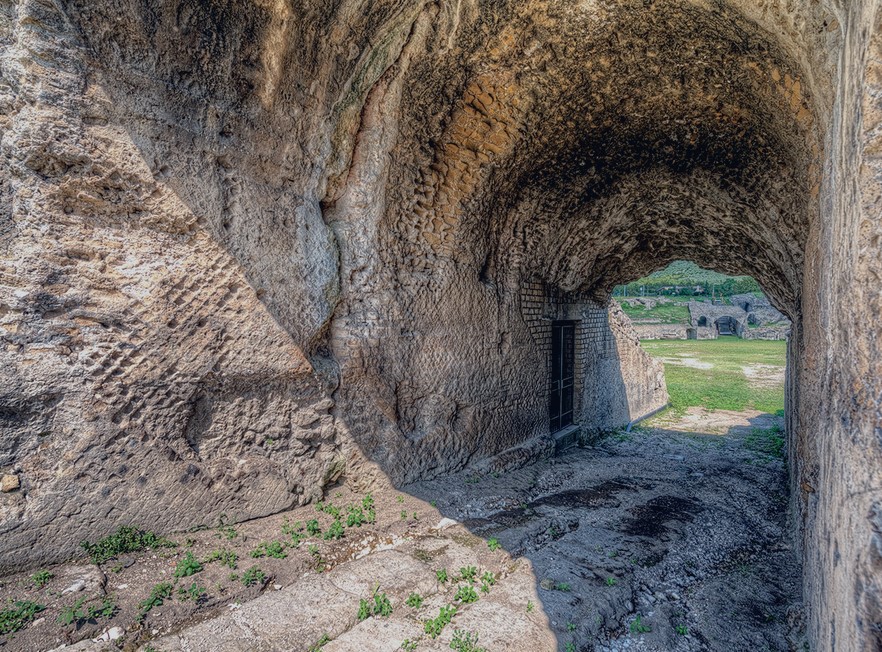 Abella’s Roman amphitheater constructed in opus reticulatum (stonework)