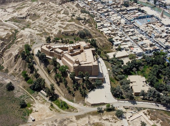 On left, the archaeological area of Susa