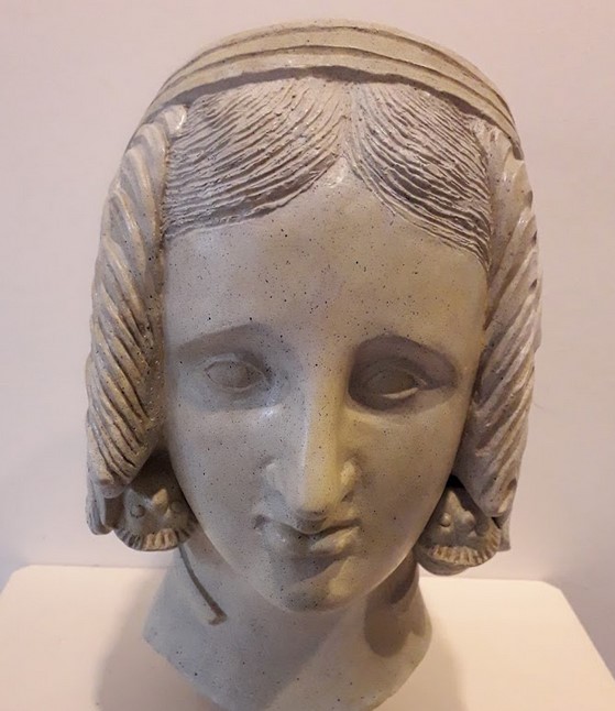 Head of a young woman. Lavinium