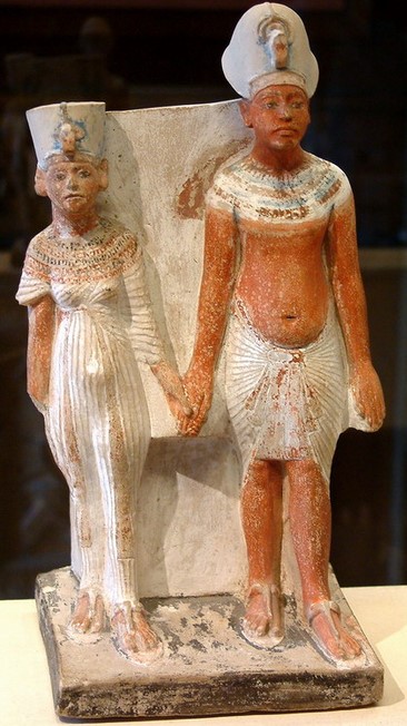 Akhenaton and Nefertiti, Painted limestone. Paris, Louvre Museum